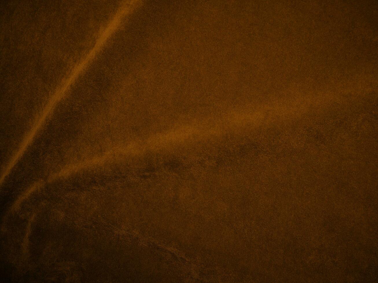 Orange velvet fabric texture used as background. orange fabric background of soft and smooth textile material. There is space for text. photo