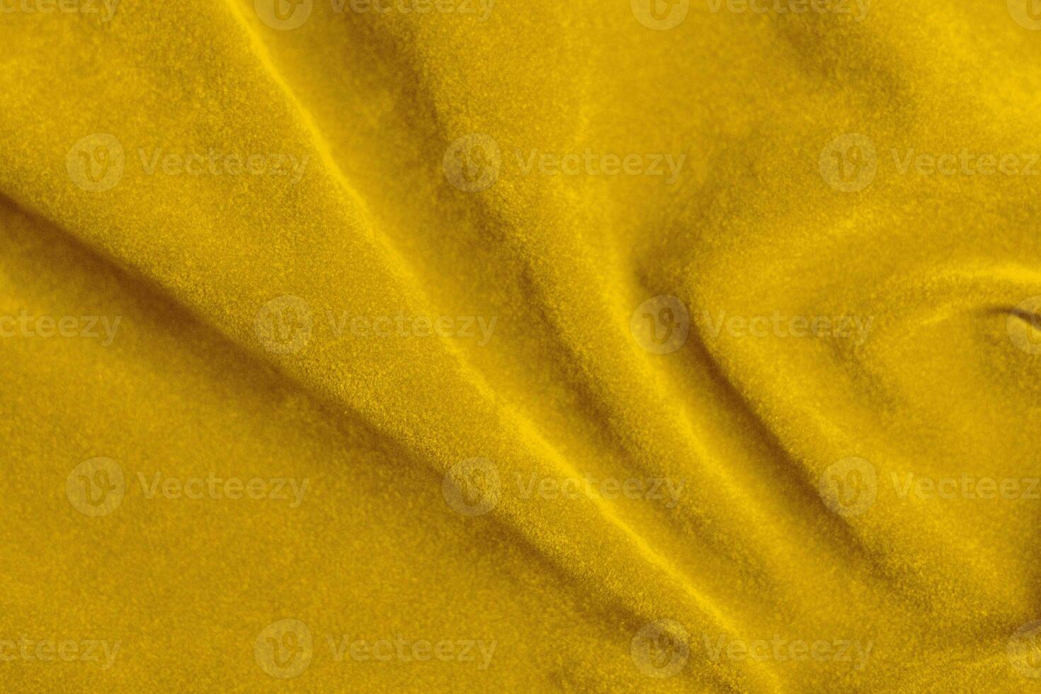 Yellow velvet fabric texture used as background. violet fabric background of soft and smooth textile material. There is space for text. photo