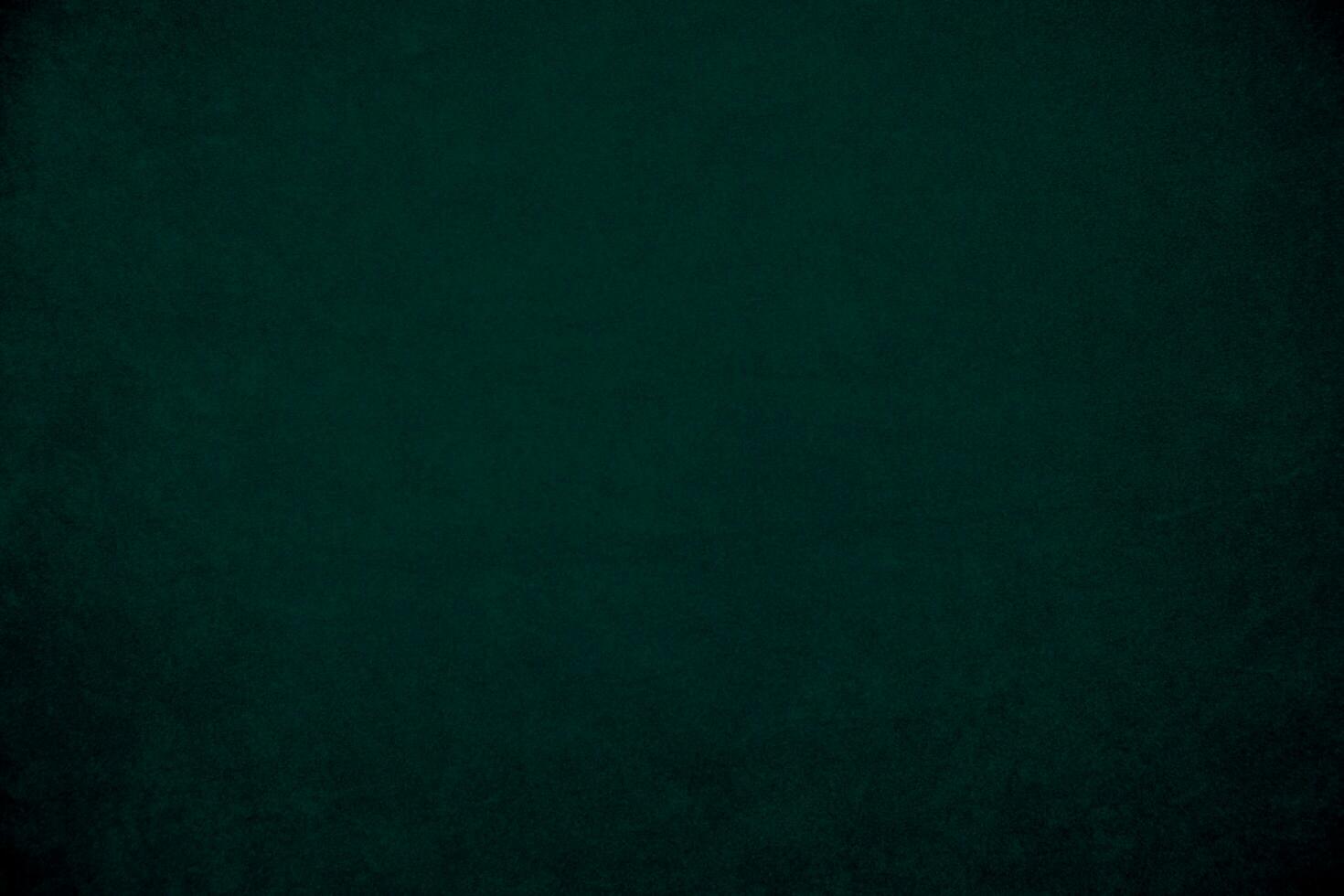Green velvet fabric texture used as background. Empty green fabric