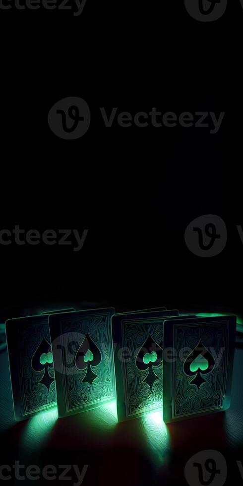 Green Playing Cards with Spade Symbol, Light Effect on Dark Background and Copy Space. . photo