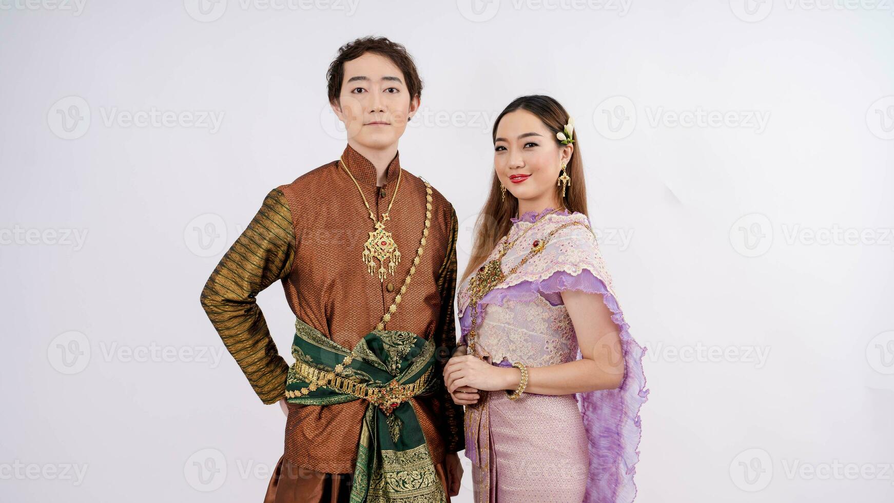 Luxury portrait of asian women and Men in traditional thai costume smiling isolated on white background, Thailand traditional culture photo