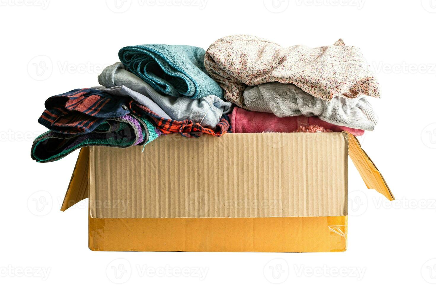 Donation box with used clothes isolated on white background with clipping path to support help for poor people in the world. photo