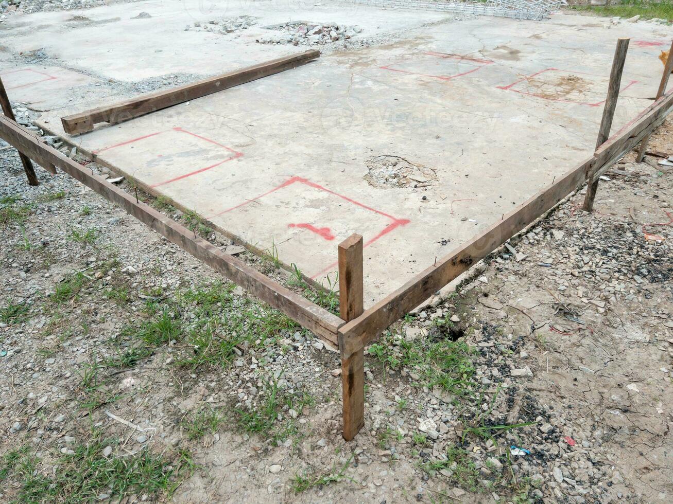 The concrete base with the wooden frame. photo
