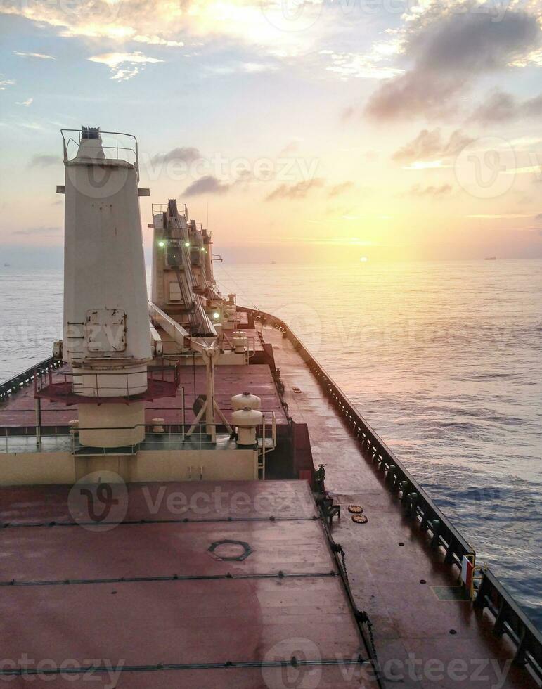 General cargo ship argosy in ocean photo
