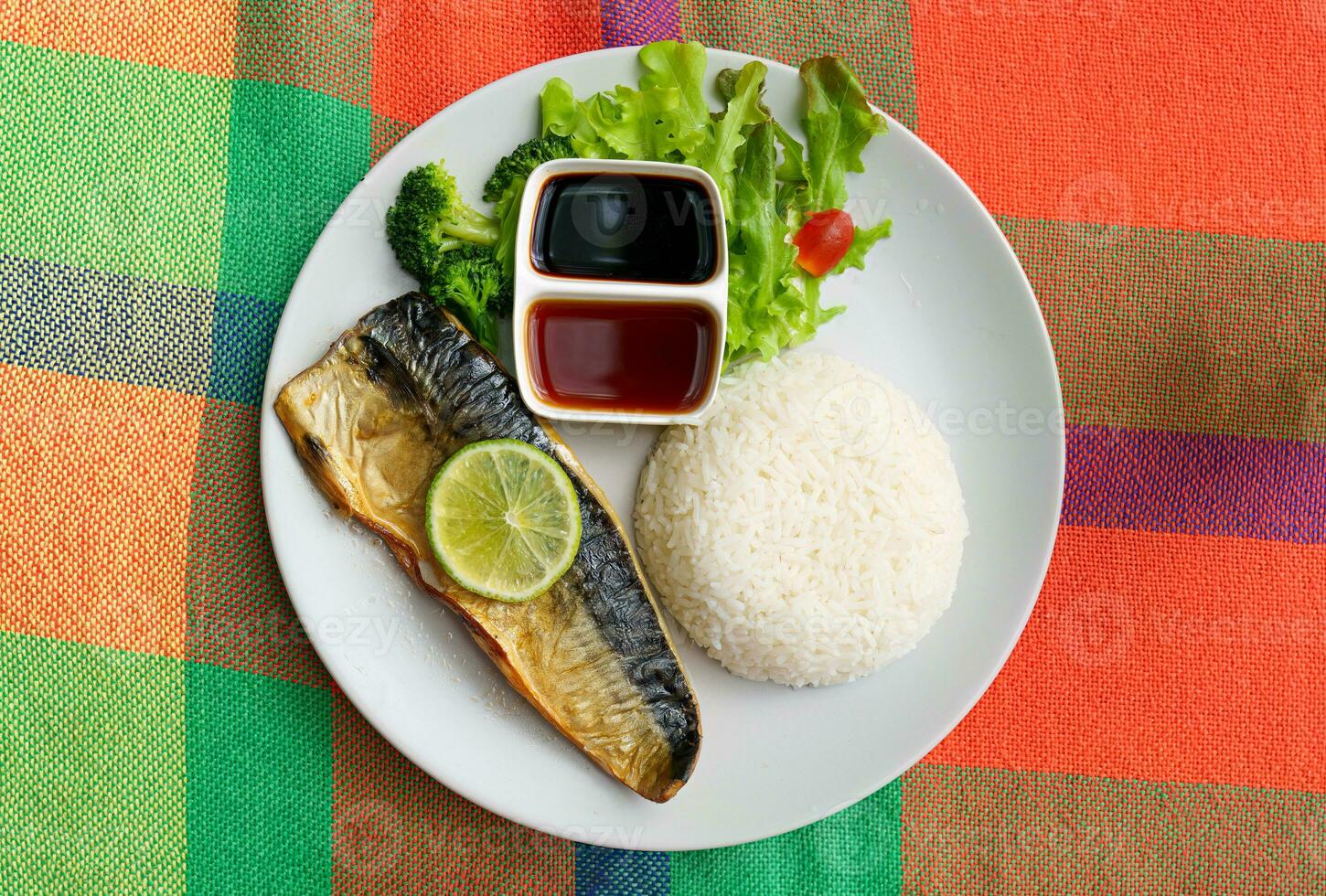 Grilled Saba or Mackerel menu with sweet sauce, vegetable and rice on