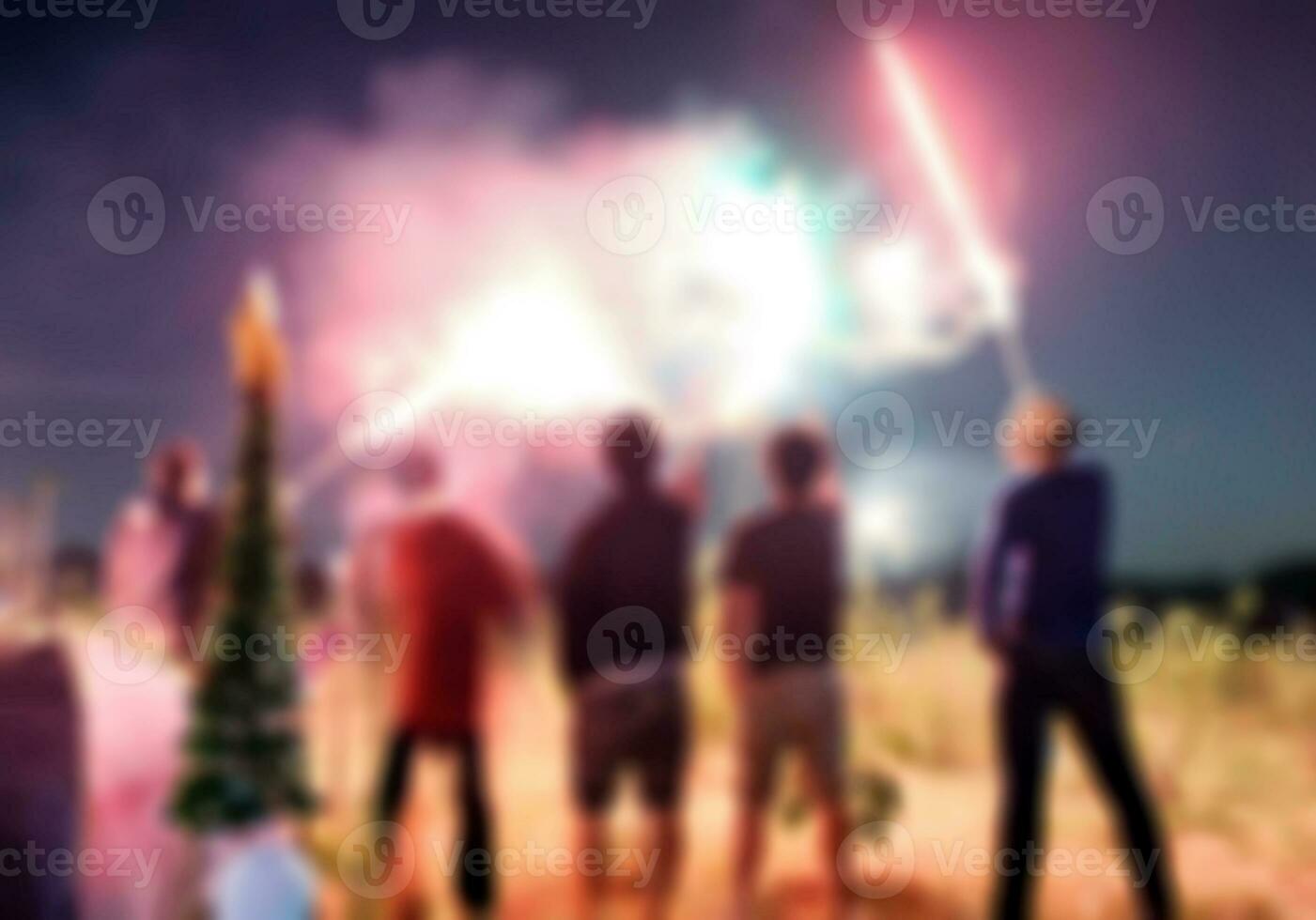 Blurred scene friend celebration playing sparkler photo