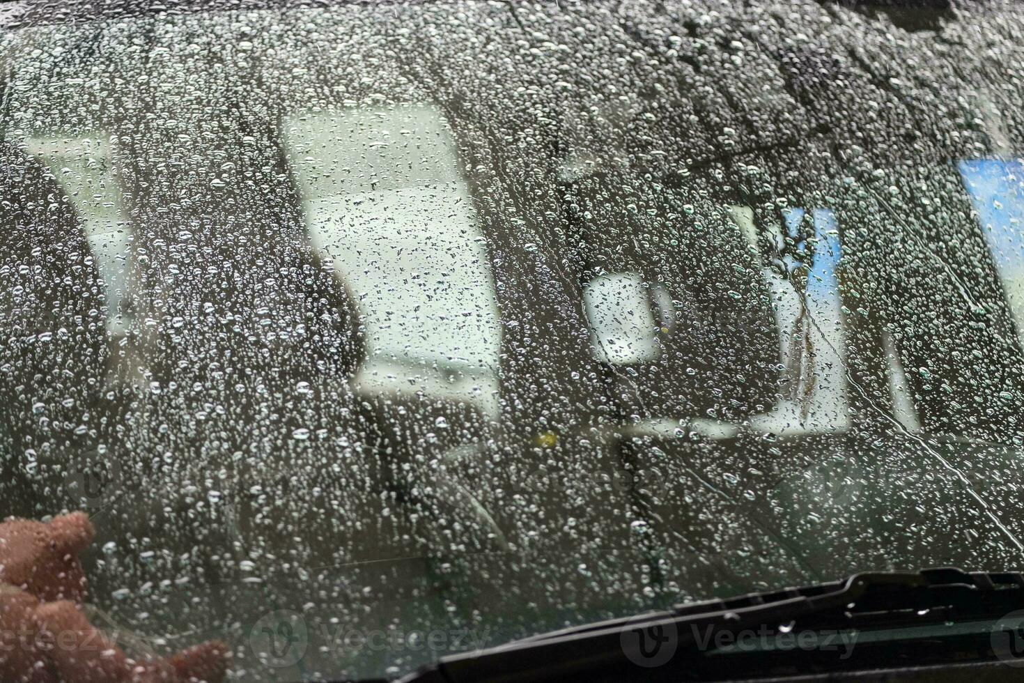 Front glass raindrop on car photo