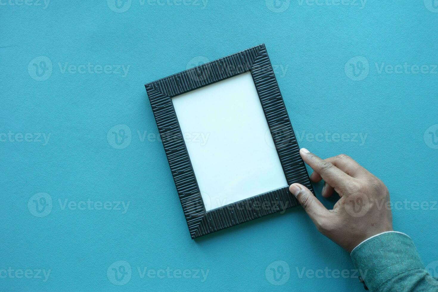 top view of empty frame on table photo