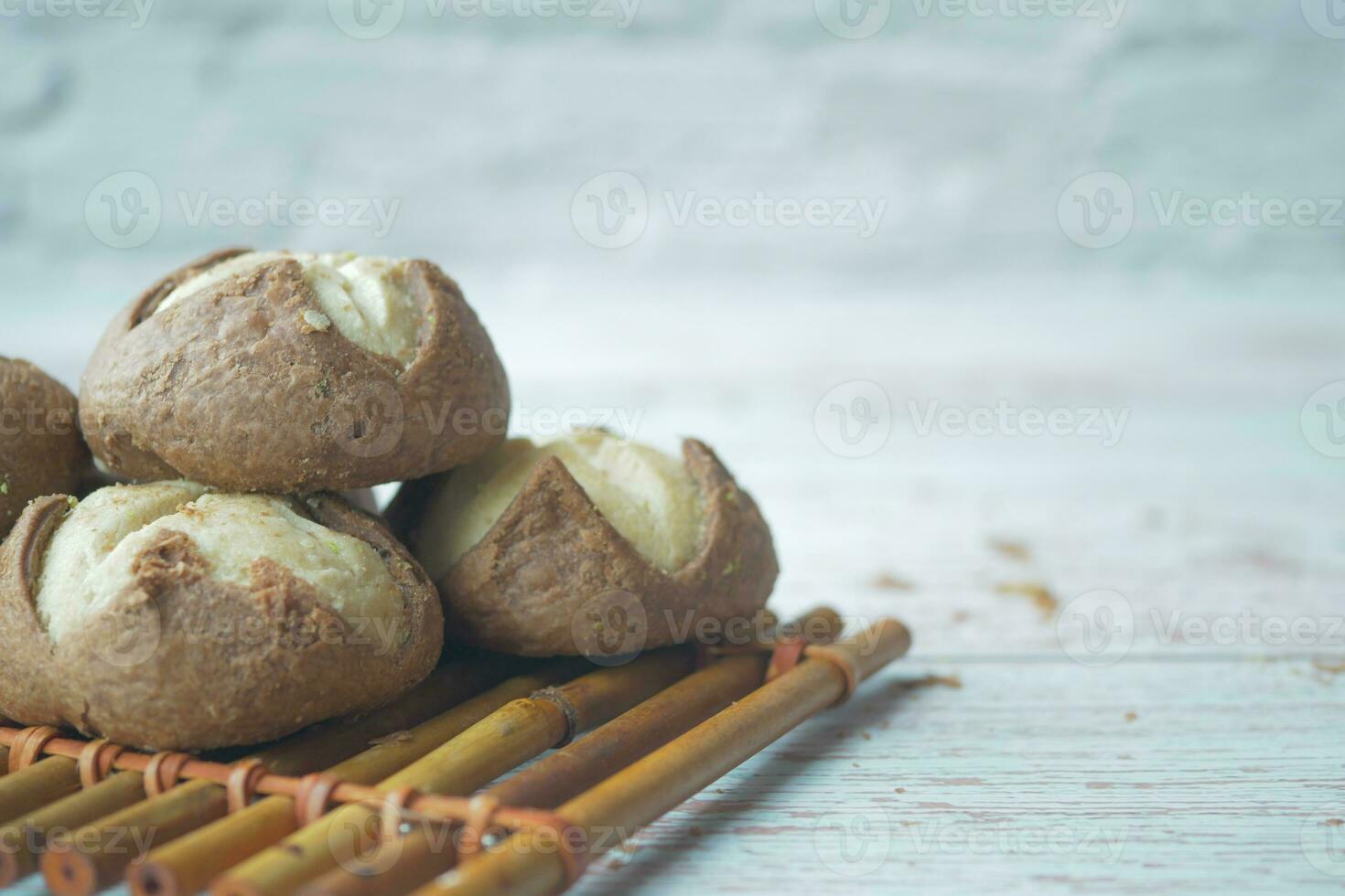 close up of sweet cookies on wooden table photo