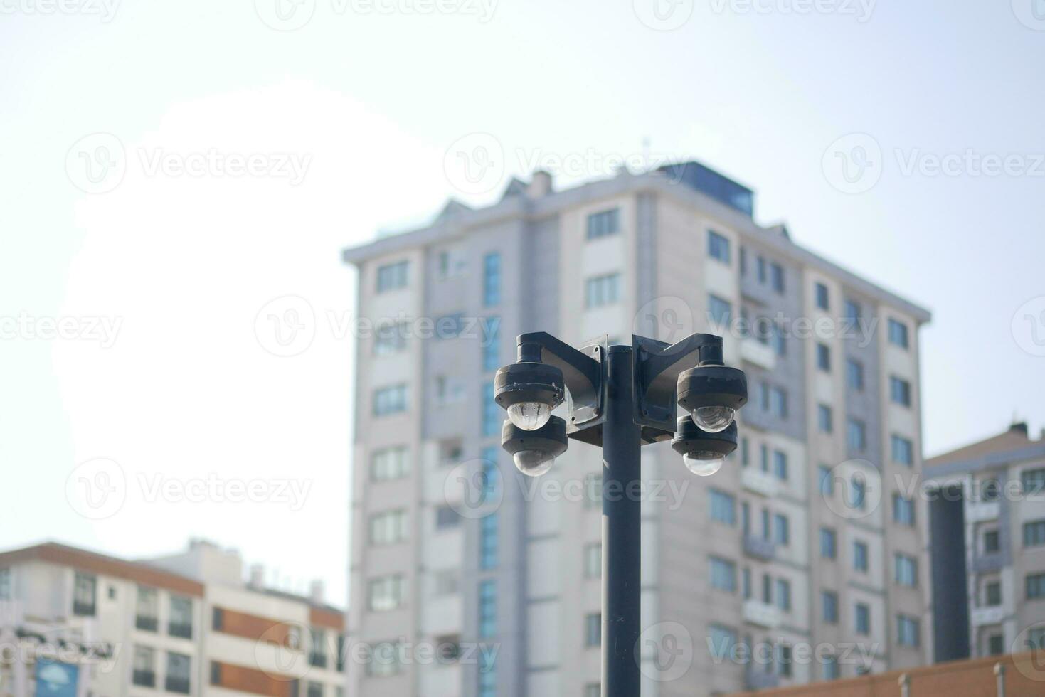 CCTV security camera operating outdoor photo