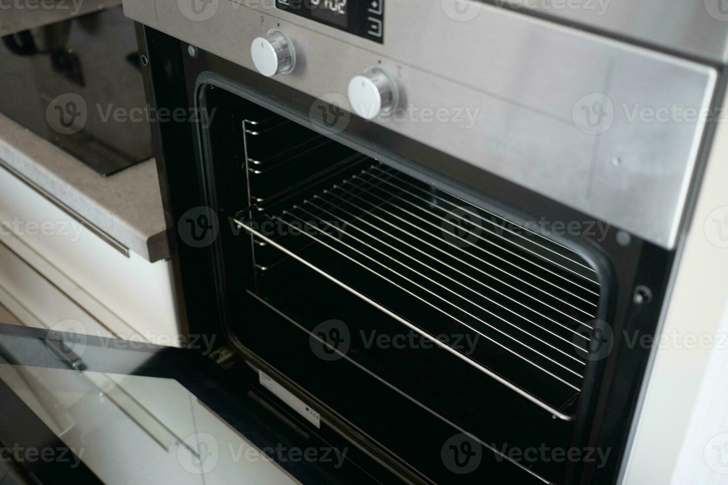 open electric oven at home photo