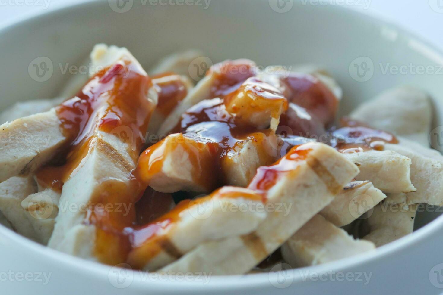 Chicken breast fillet and vegetables on table . photo