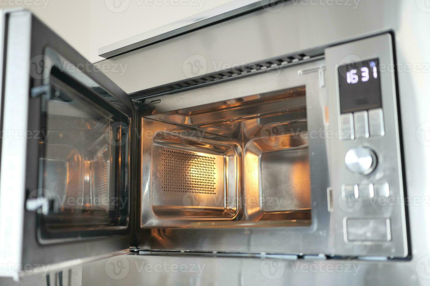 open electric oven at home photo