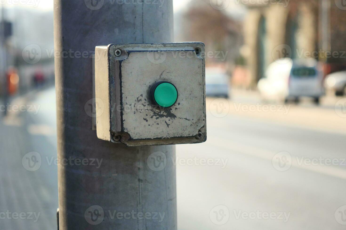 close up of crossing signal button in singapore photo