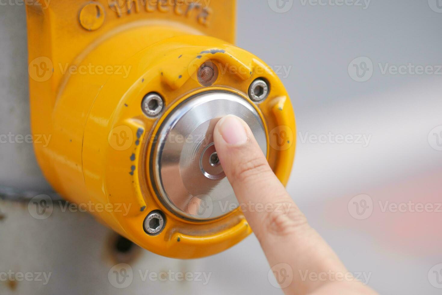 close up of crossing signal button in singapore photo