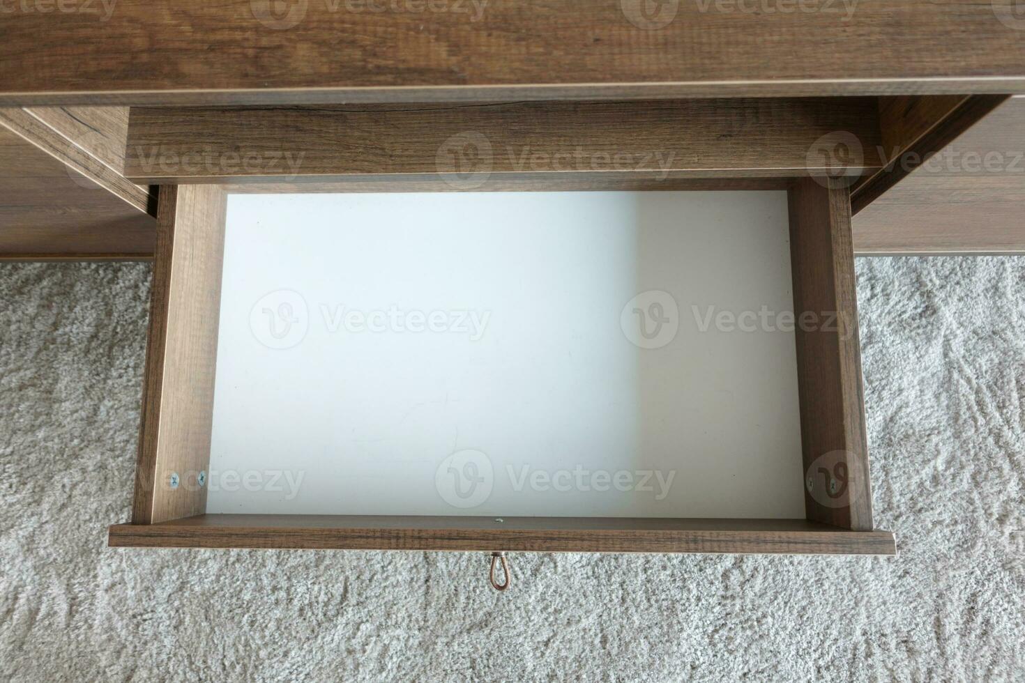 top view of a opened empty drawer photo