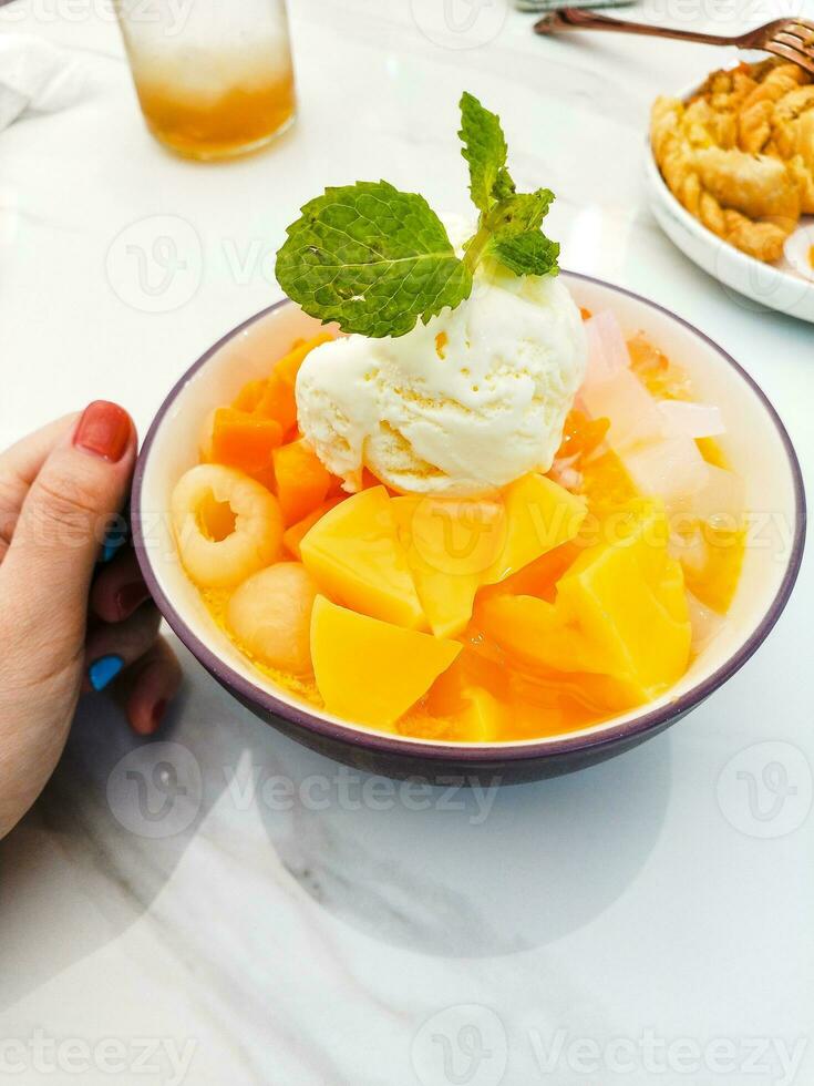 ice cream with mango and mint photo
