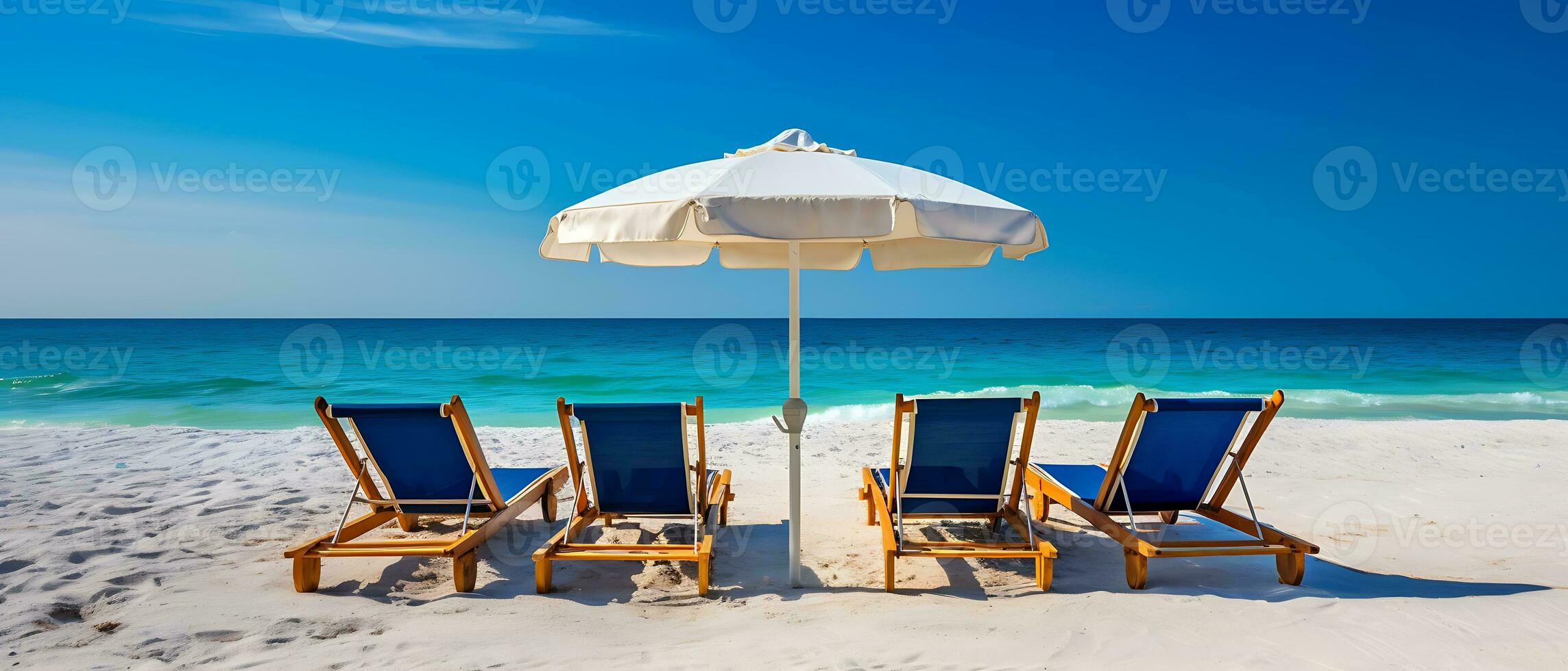 Summer chairs and umbrellas are set up on a tropical beach with a backdrop of blue sky and sea. Generative AI photo