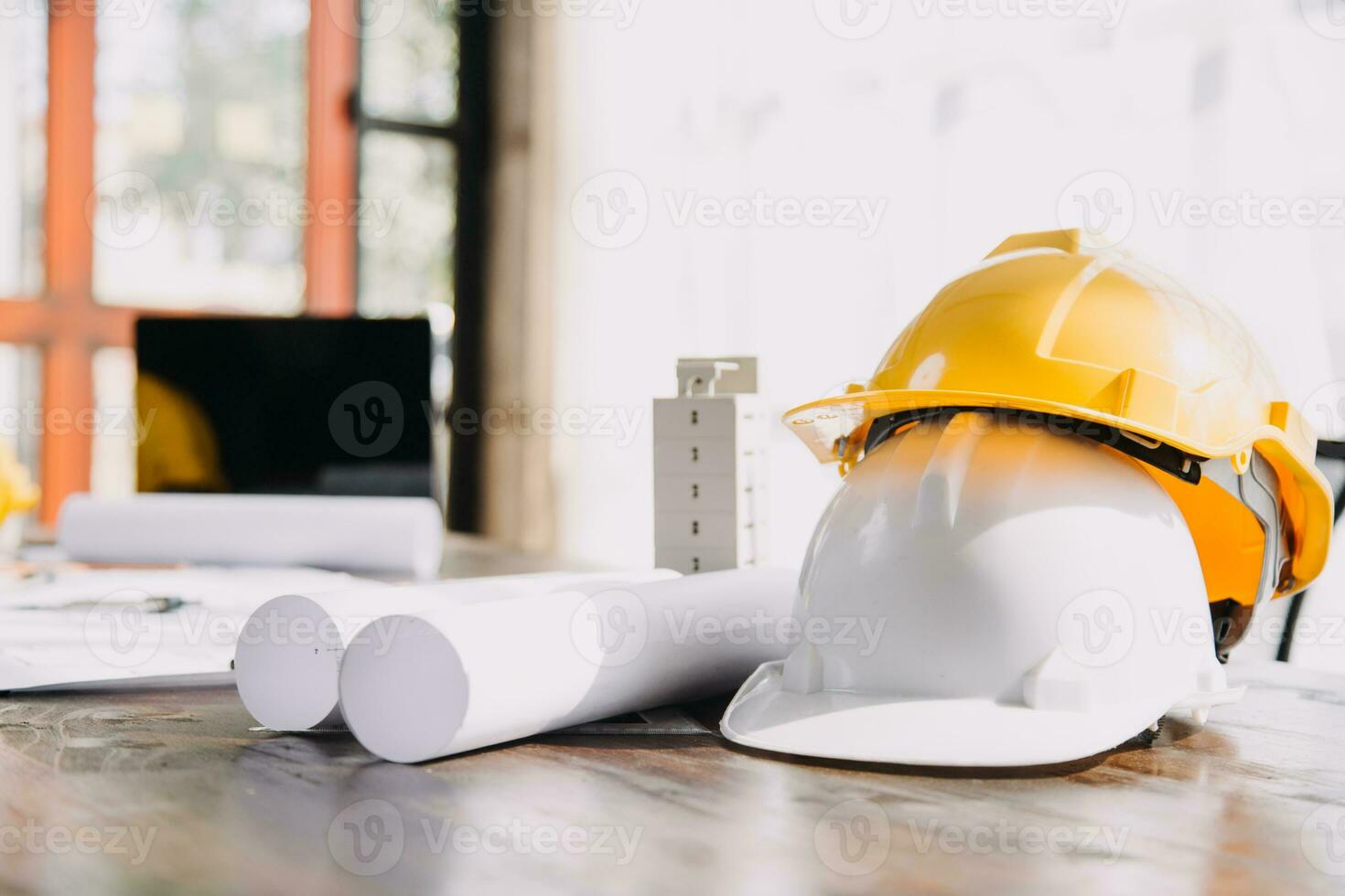 Construction and structure concept of engineer working drawing on blueprint meeting for project working with partner on model building and engineering tools in working site, construction concept. photo