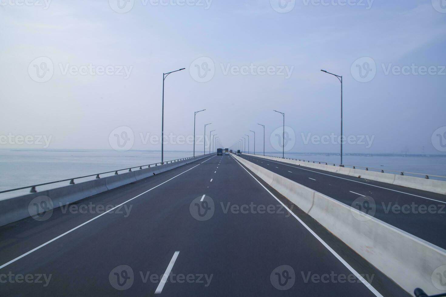 Padma Bridg Highway asphalt with blue sky Background. Perspective view photo
