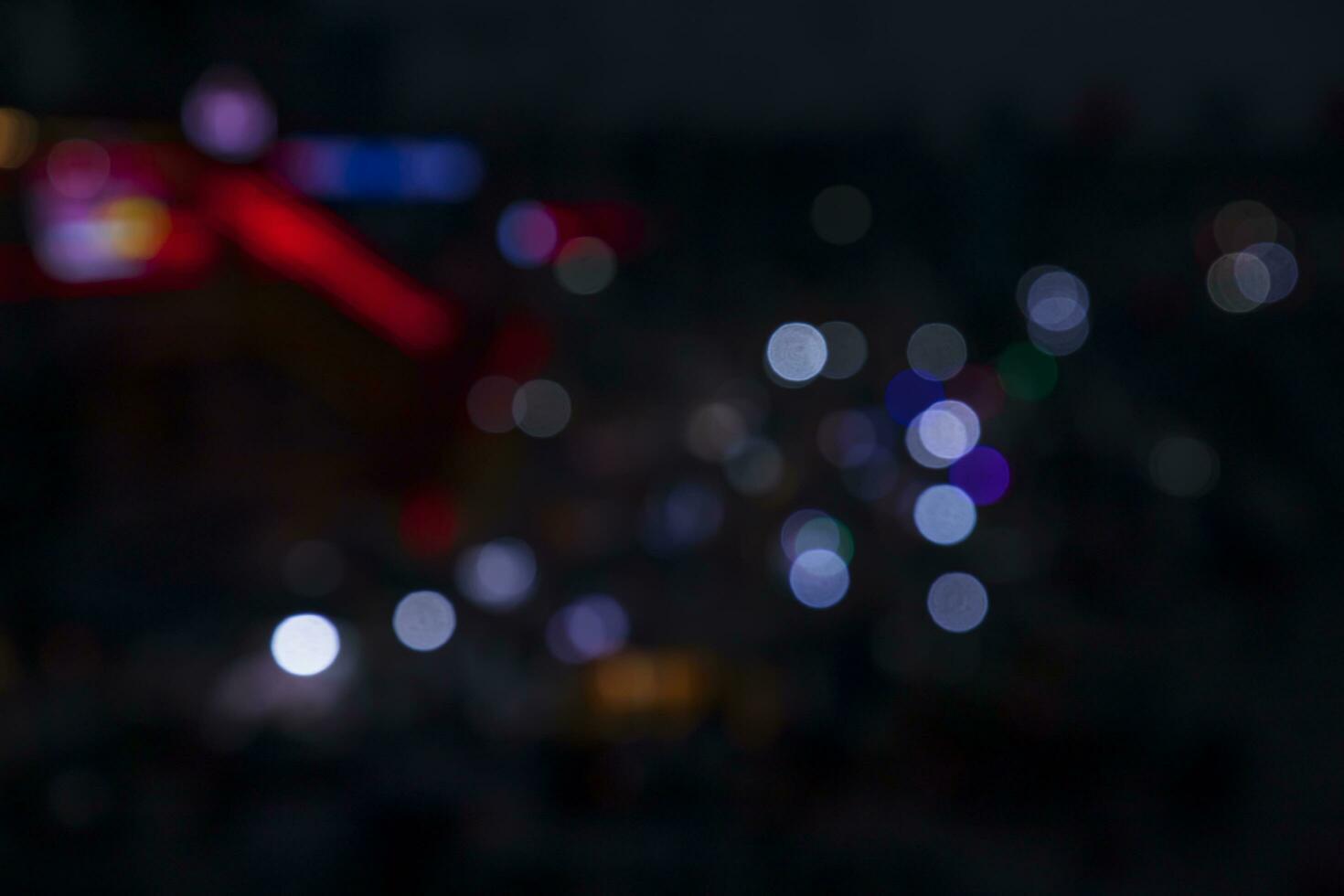 Colorful Defocus Abstract bokeh street lights effects on the night black background texture photo