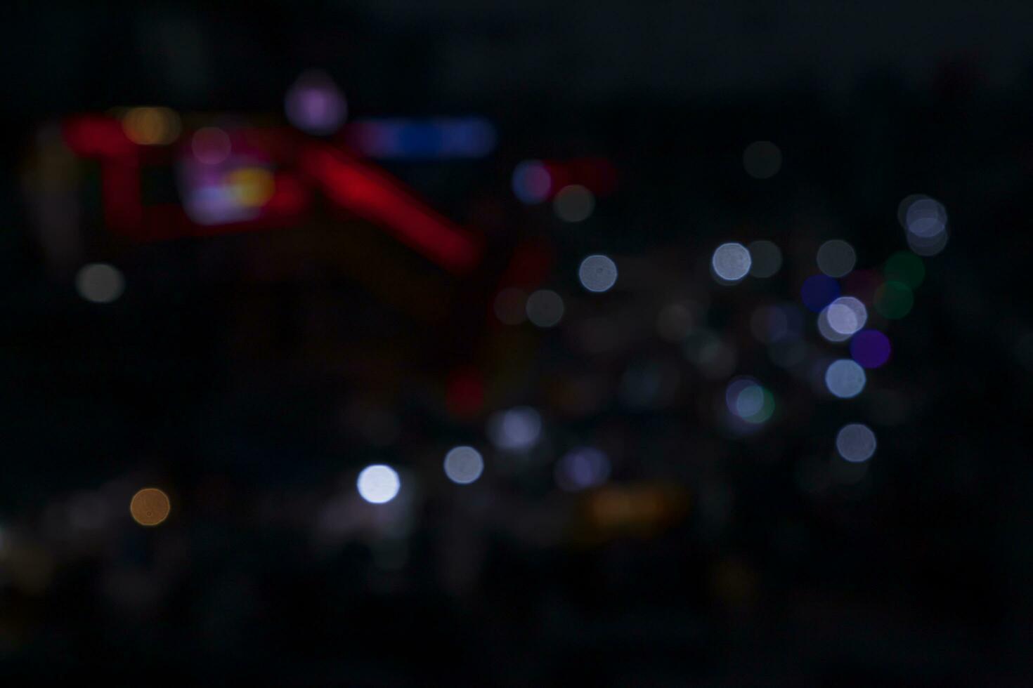 Colorful Defocus Abstract bokeh street lights effects on the night black background texture photo