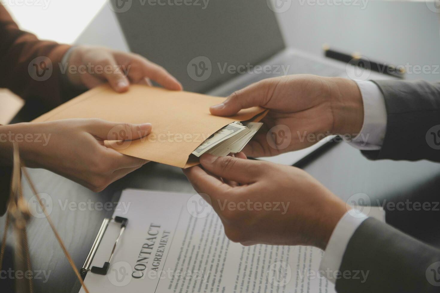 Business and lawyers discussing contract papers with brass scale on desk in office. Law, legal services, advice, justice and law concept picture with film grain effect photo