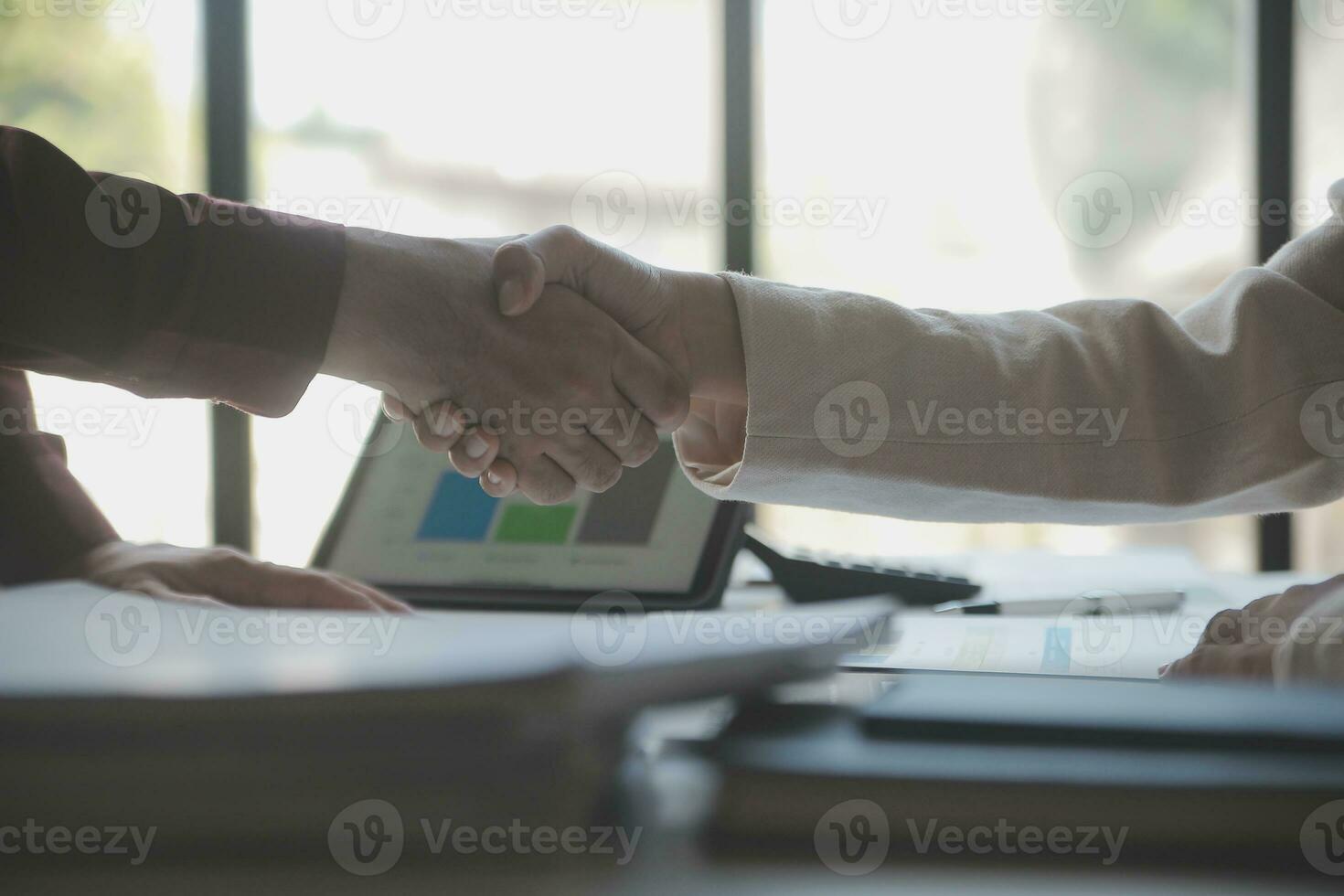 Audit concept,Administrator business man financial inspector and secretary making report calculating balance. Internal Revenue Service checking document. photo