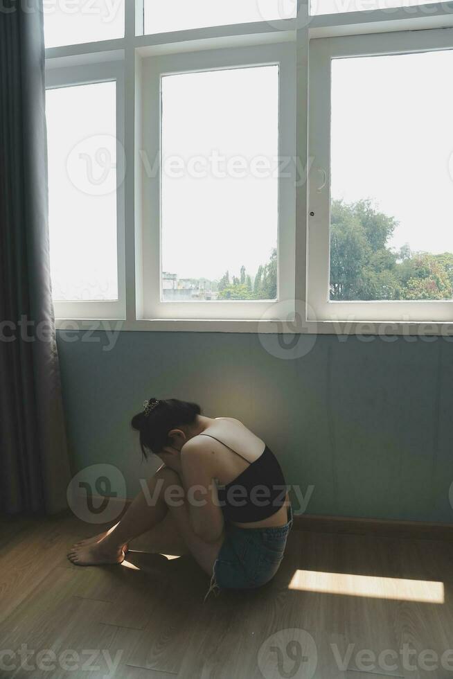 panic attacks alone young girl sad fear stressful depressed emotional.crying use hand cover face begging help.stop abusing domestic violence in women,person with health anxiety,people bad feeling down photo