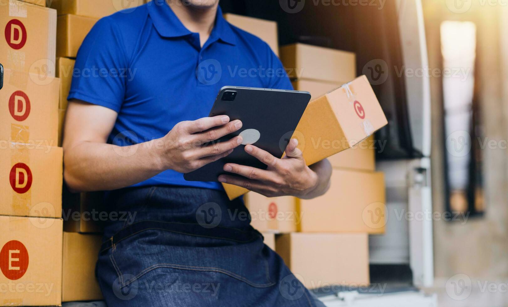 Starting small businesses SME owners man entrepreneurs working, box and check online orders to prepare to pack the boxes, sell to customers, sme business ideas online. photo