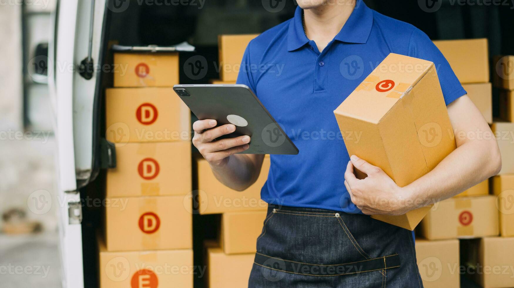 Starting small businesses SME owners man entrepreneurs working, box and check online orders to prepare to pack the boxes, sell to customers, sme business ideas online. photo