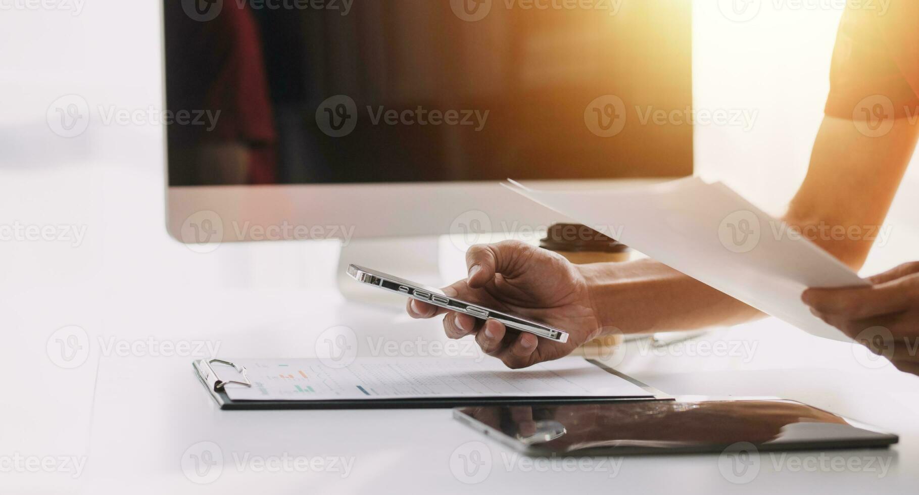 Audit concept,Administrator business man financial inspector and secretary making report calculating balance. Internal Revenue Service checking document. photo
