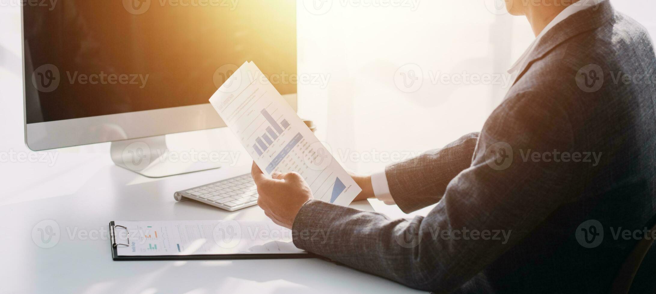 Audit concept,Administrator business man financial inspector and secretary making report calculating balance. Internal Revenue Service checking document. photo