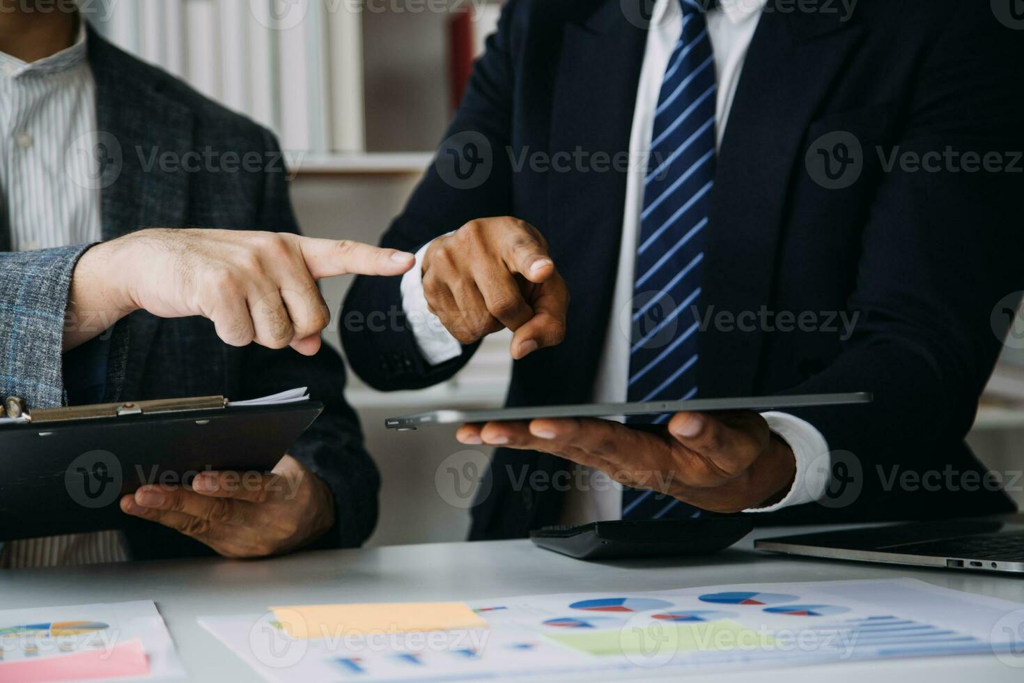 Audit concept,Administrator business man financial inspector and secretary making report calculating balance. Internal Revenue Service checking document. photo
