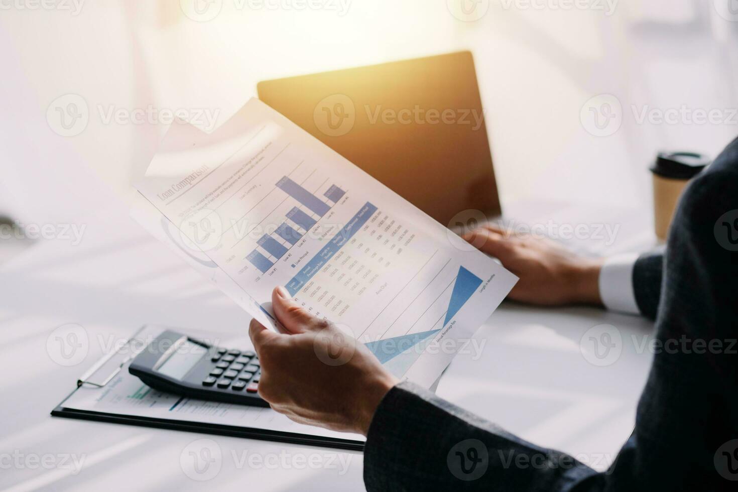 Audit concept,Administrator business man financial inspector and secretary making report calculating balance. Internal Revenue Service checking document. photo