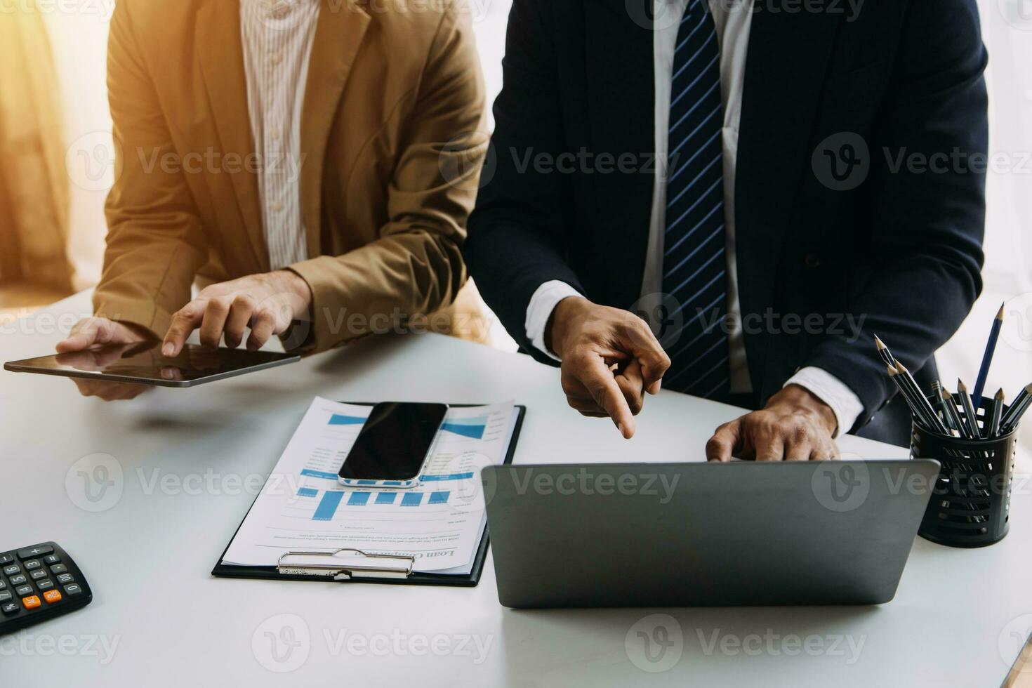 Audit concept,Administrator business man financial inspector and secretary making report calculating balance. Internal Revenue Service checking document. photo