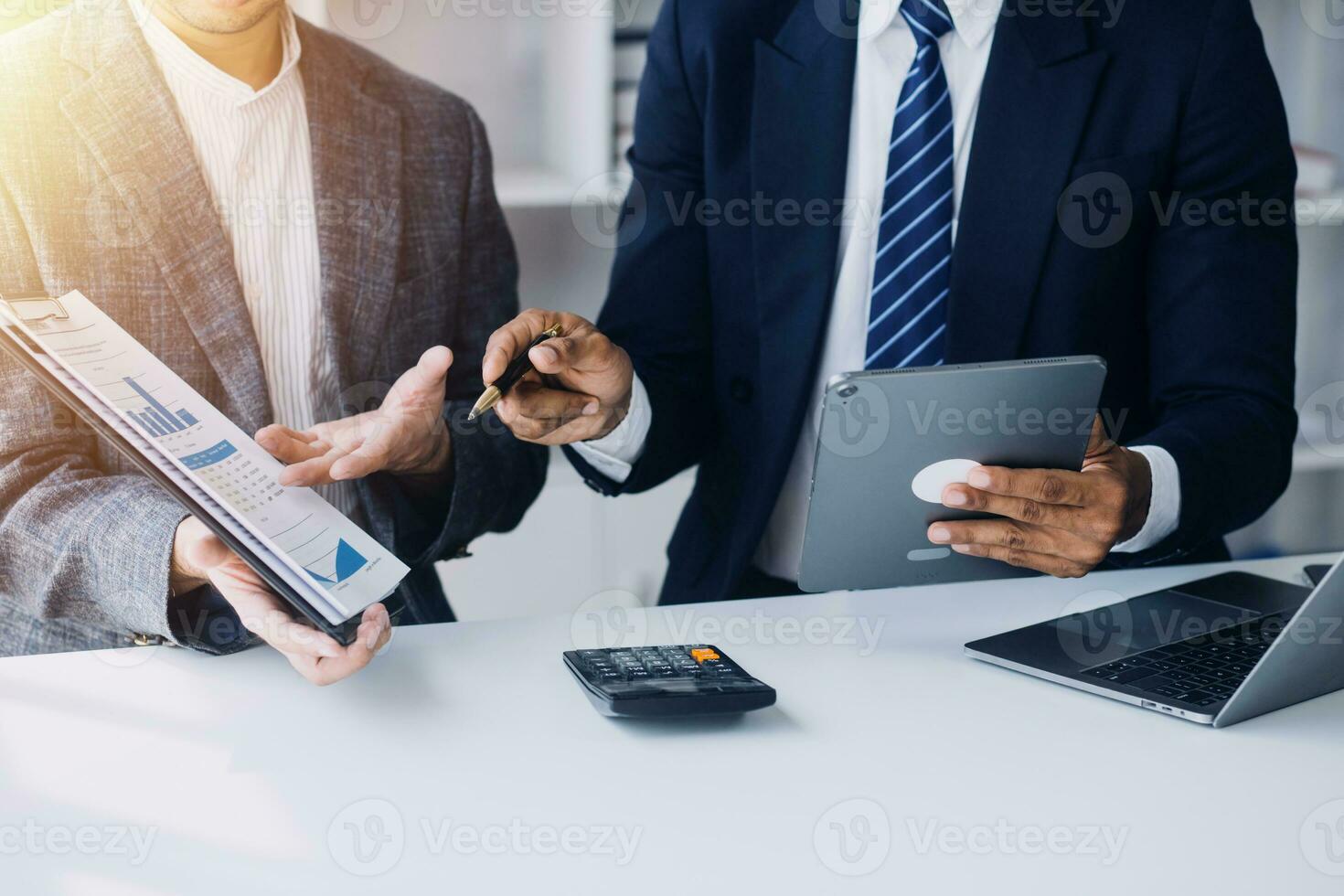 Audit concept,Administrator business man financial inspector and secretary making report calculating balance. Internal Revenue Service checking document. photo