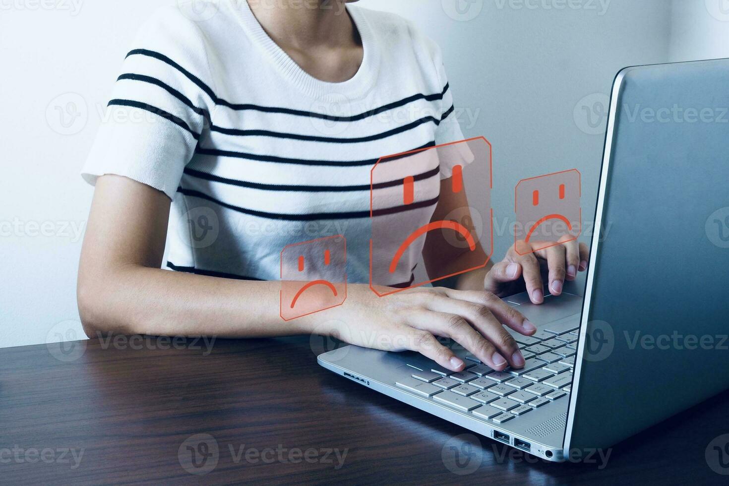 Unhappy customer with sad mood on laptop Poor reviews and service, dislikes, poor quality, low ratings and endorsement ideas. photo