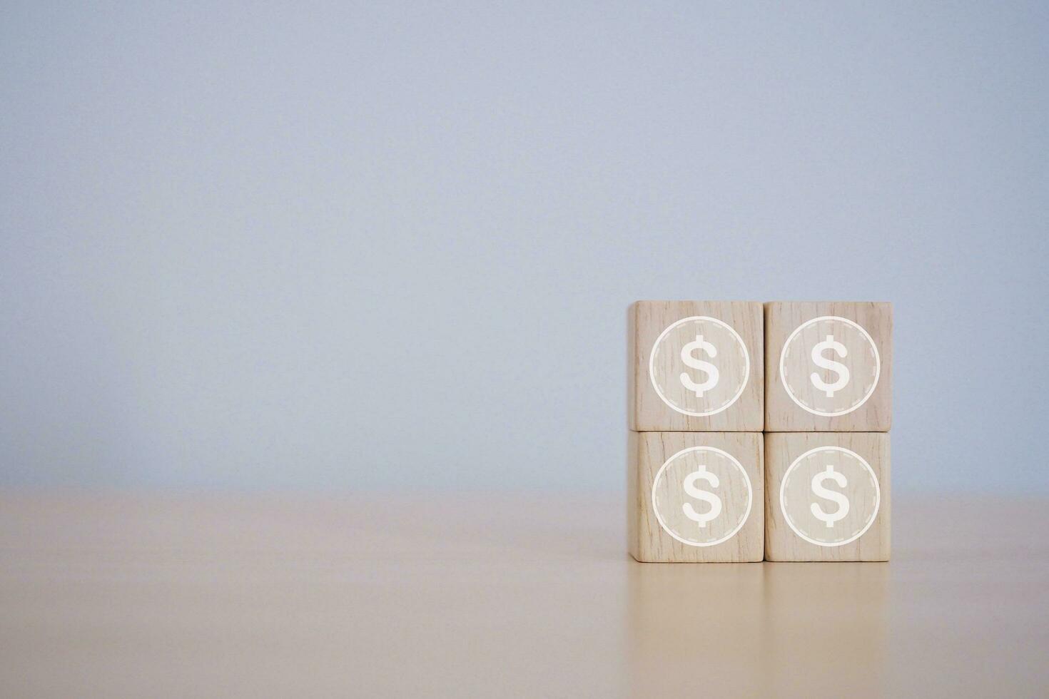 Financial concept or business growth dollar icon on wooden cube. photo