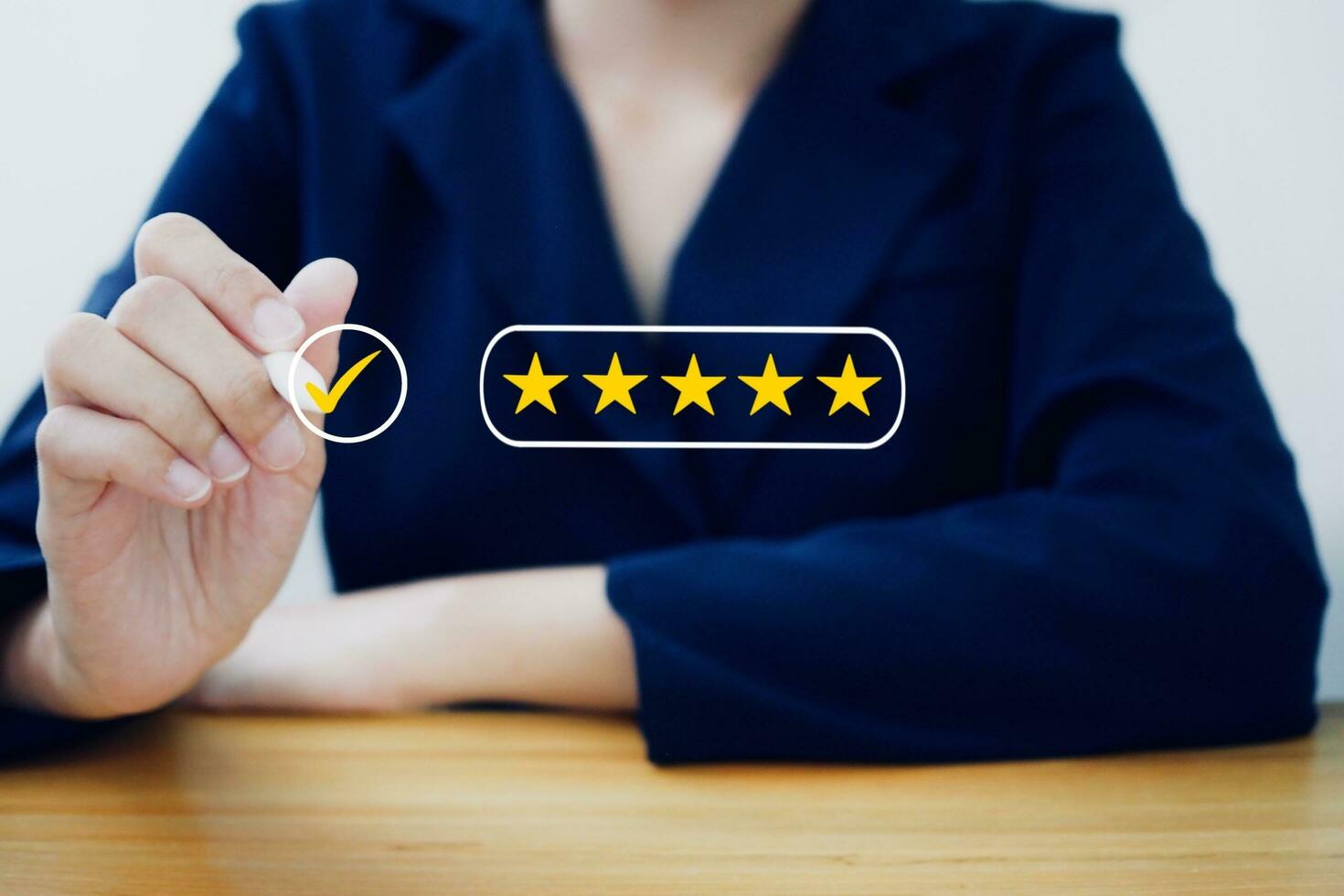 Feedback scores and positive customer reviews. service and satisfaction Business people selecting check mark icon To provide satisfaction with 5-star service. photo