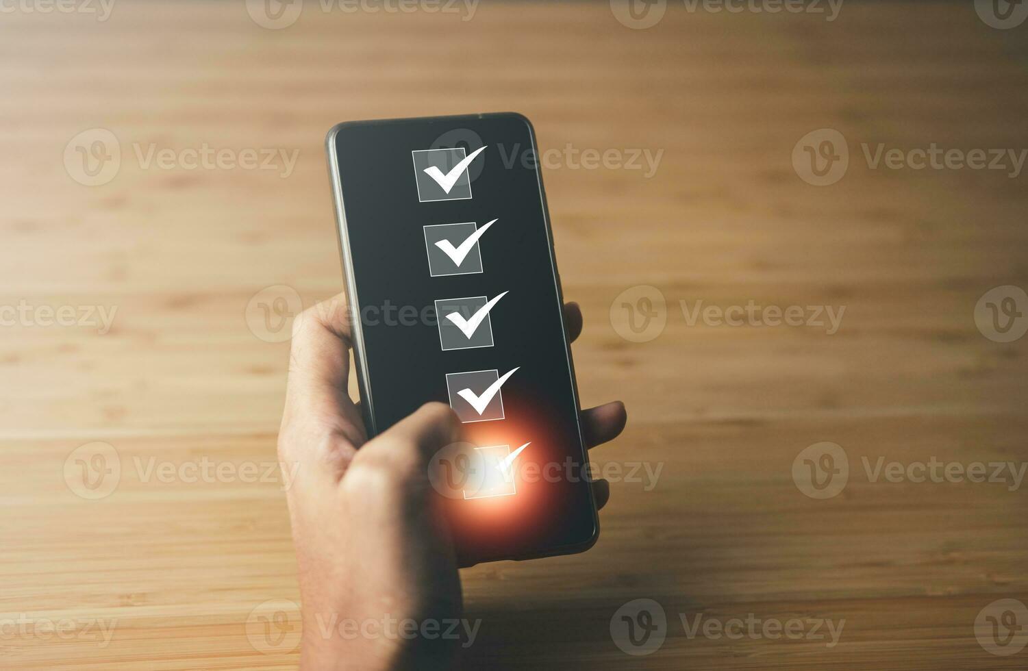 Businessman checking mark the check box. questionnaire and business concept. photo