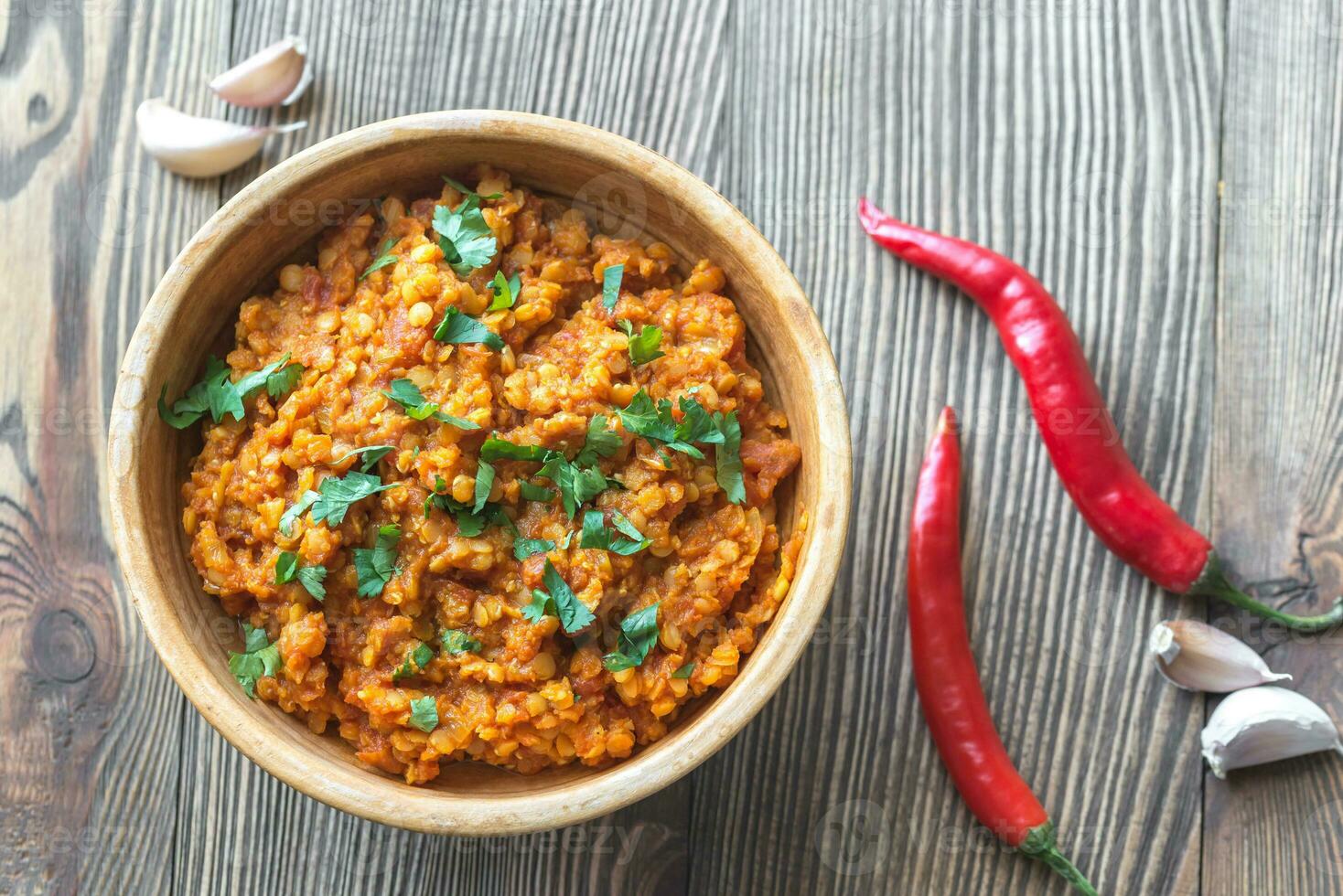 Bowl of red lentil curry photo