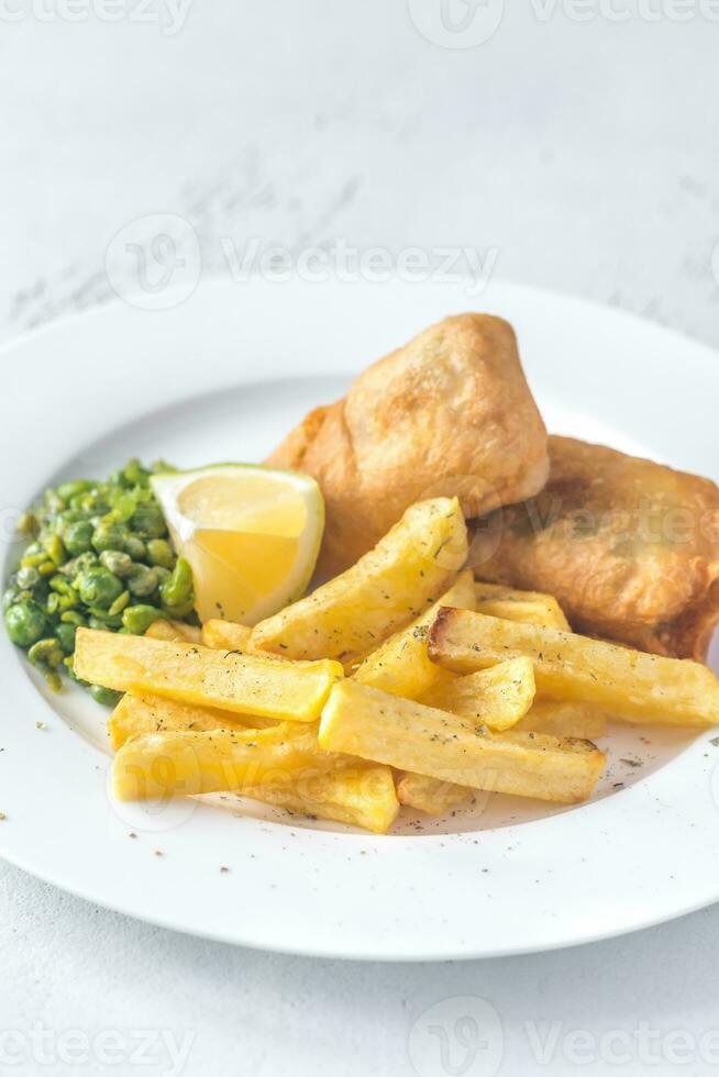 Portion of fish and chips photo