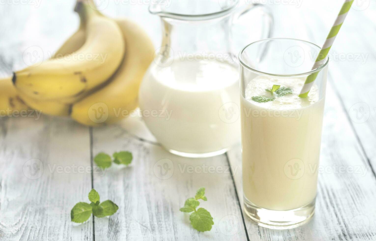 Glass of banana milk shake photo