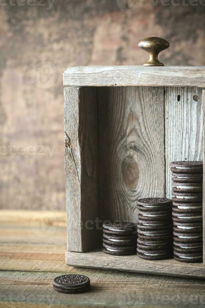 Chocolate cookies with creamy filling photo