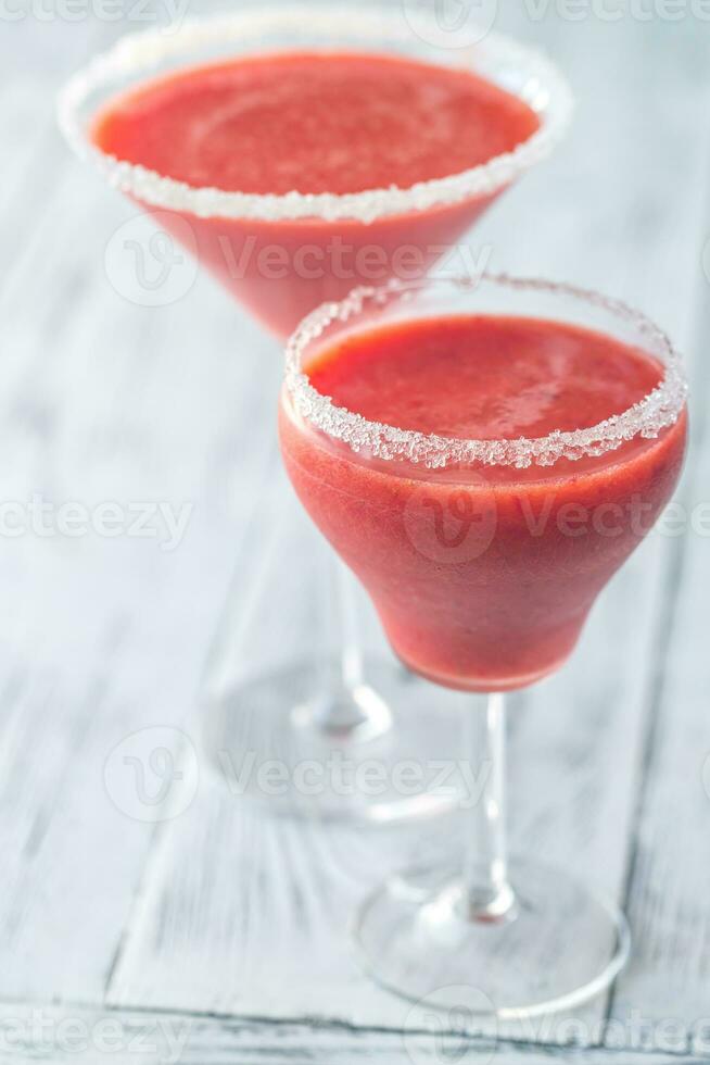 Two glasses of strawberry margarita cocktail photo