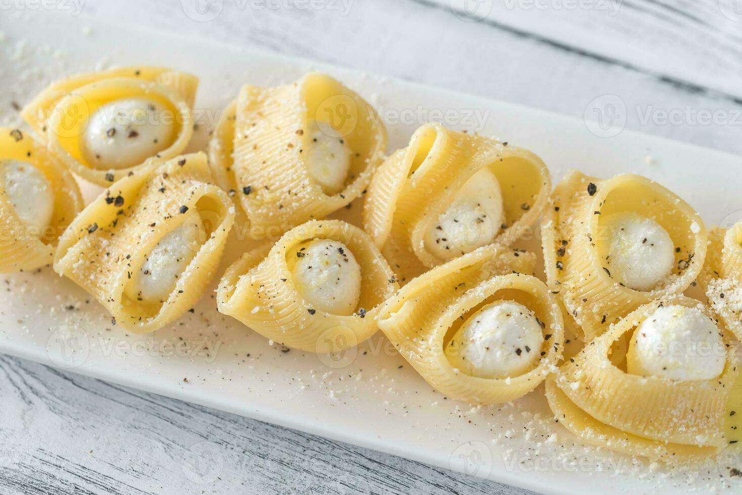 Lumaconi pasta stuffed with bocconcini photo