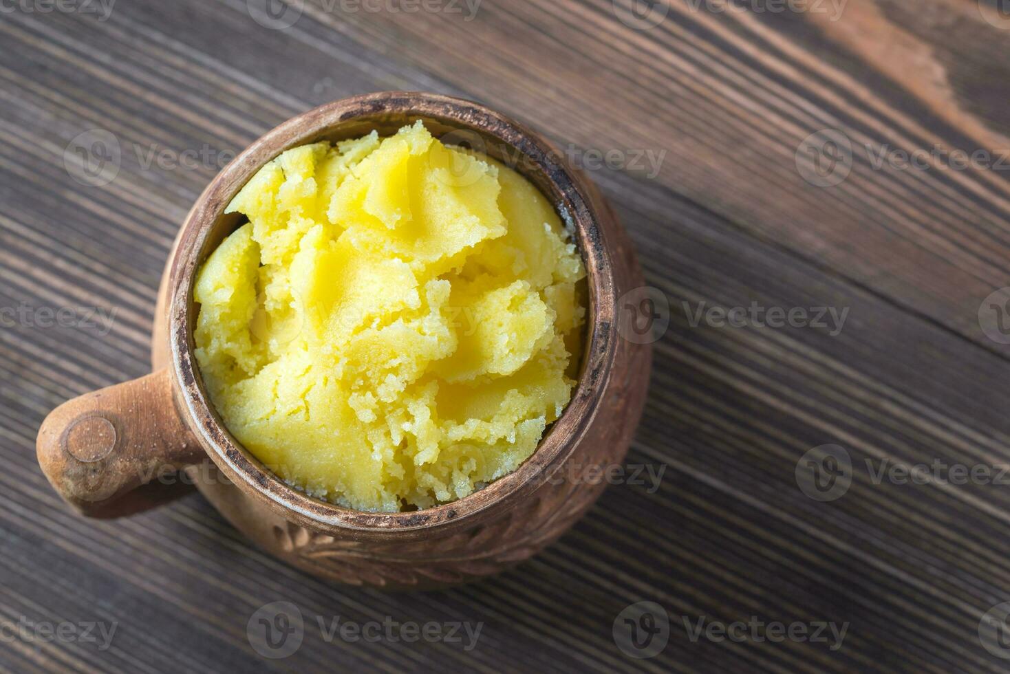 Bowl of ghee clarified butter photo