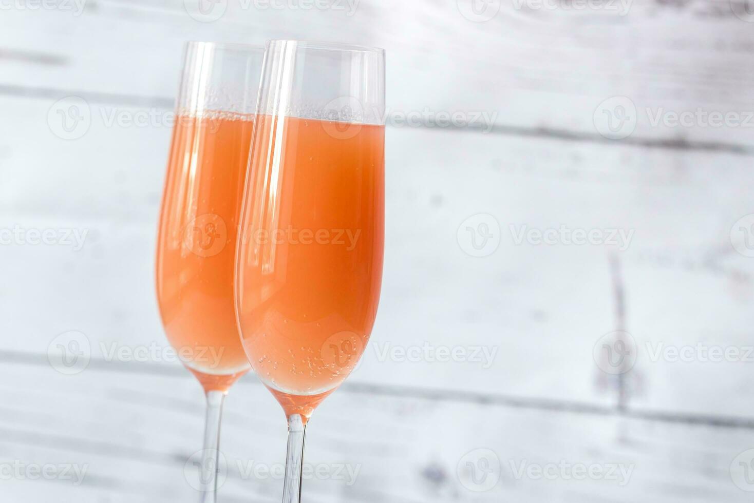 Two glasses of bellini cocktail photo