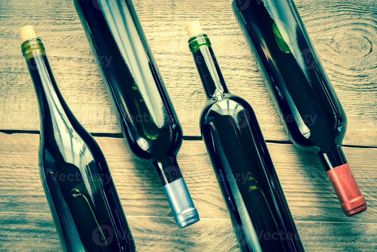 Bottles with red wine photo